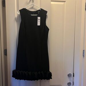 Elegant Black Dress with Ruffle Hem